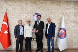 Yönetim Kurulu ÇOMÜ Rektörüne ziyaret ve plaket