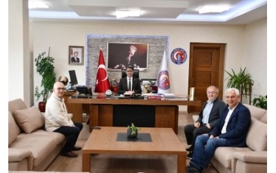 Yönetim Kurulu ÇOMÜ Rektörüne ziyaret ve plaket